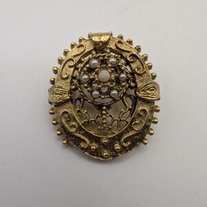 Vintage Gold Tone Oval Brooch with Faux Pearl Inlay Ornate Filigree Design